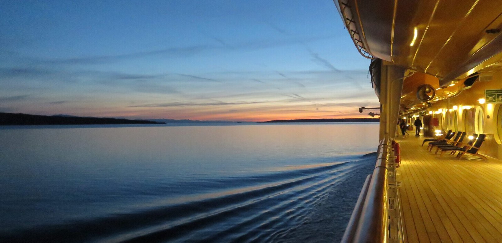 A cruise ship deck at sunset